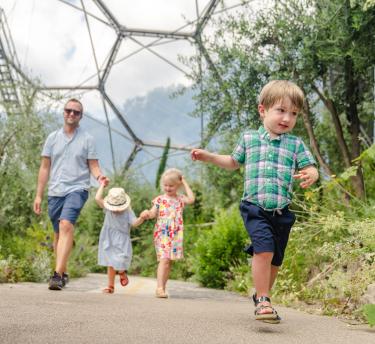 Family walking through Mediterranean Biome at Eden Project